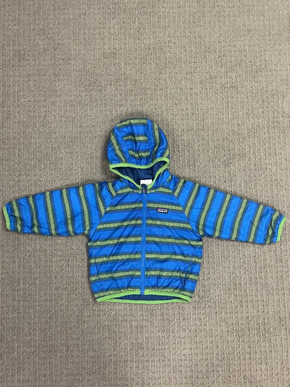 Patagonia reversible puffer jacket. Baby size 24 mos. Blue/Green/Yellow stripe.